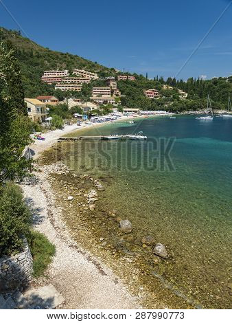 The White Beach In Kalami, Former Residence Of British Authors Lawrence And Gerald Durrell And Their