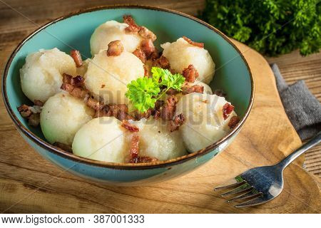 Meat Stuffed Potato Dumplings With Fried Onion And Greaves.