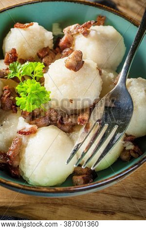 Meat Stuffed Potato Dumplings With Fried Onion And Greaves.