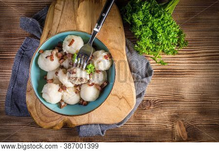 Meat Stuffed Potato Dumplings With Fried Onion And Greaves.