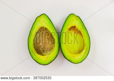 Open Avocado On A White Background. Avocado Macro. Close Up Of An Avacado. Avocado Isolated On White