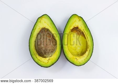 Open Avocado On A White Background. Avocado Macro. Close Up Avacado. Avocado Isolated On White Backg