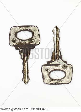 Old Key Isolated. Keys On Table. Ancient Keys, Used For Long Time. Vintage Key On White Background.
