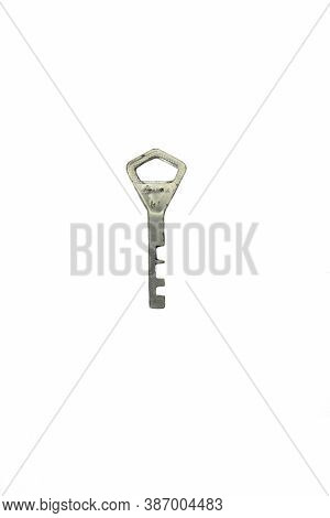 Old Key Isolated. Keys On Table. Ancient Keys, Used For Long Time. Vintage Key On White Background.