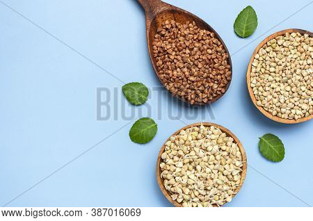 Green Buckwheat, Sprouted Buckwheat In Wooden Bowls Brown Buckwheat Grains In Wooden Spoon With Gree