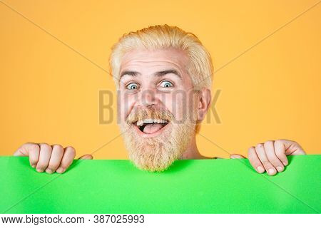 Smiling Man Show Clear Green Paper. Happy Man Holding Empty White Board