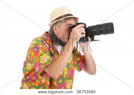 Typical tourist with big camera taking pictures