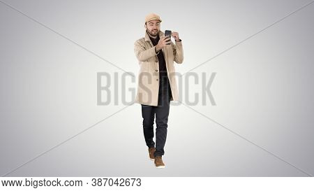 Autumn Fashion Style Man Recording Video Blog Walking On Gradien
