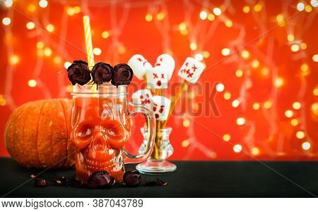 Banner. Glass Mug Skull With Red Tomato Juice. A Welcome Cocktail At A Halloween Party. Marshmello S