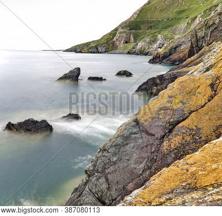Bray To Greystones Cliff Walk. Long-exposure Shot Of Coastal Line In Bray, Co. Wicklow, Ireland