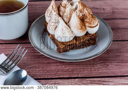 Mini Chocolate Cake With A Cup Of Tea.