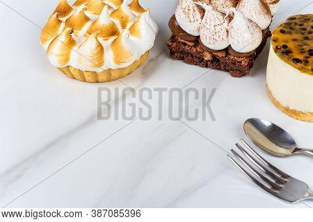 Mini Chocolate, Lemon Pie And Passion Fruit Cake.