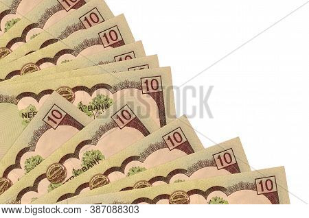10 Nepalese Rupees Bills Lies Isolated On White Background With Copy Space Stacked In Fan Close Up