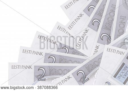 2 Estonian Kroon Bills Lies In Different Order Isolated On White. Local Banking Or Money Making Conc