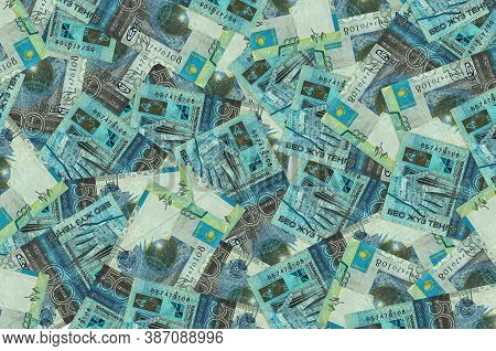 500 Kazakhstani Tenge Bills Lies In Big Pile. Rich Life Conceptual Background