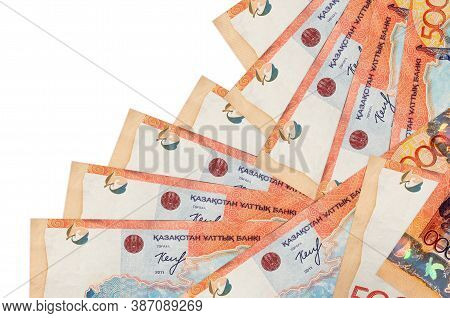 5000 Kazakhstani Tenge Bills Lies In Different Order Isolated On White. Local Banking Or Money Makin
