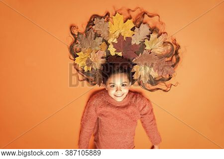 Little Girl Small Child Gorgeous Long Hair Fallen Maple Leaves. Moisturizing Conditioner. Conditioni