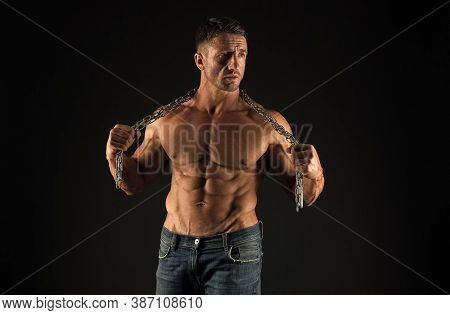 Remove Shackles. Strong Enough To Be Free. Bodybuilder Concept. Healthy And Strong. Masculine Sport.