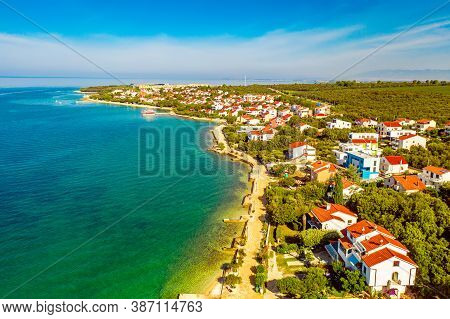 Aerial Top View Of Village Petrcane, Croatia. Touristic Background With Blue Sea, Coastline And Red 