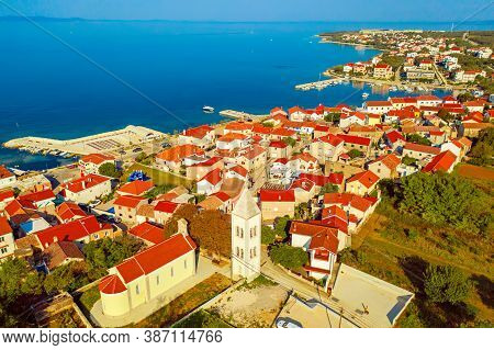 Aerial Top View Of Village Petrcane, Croatia. Touristic Background With Blue Sea And Red Roofs. Zada