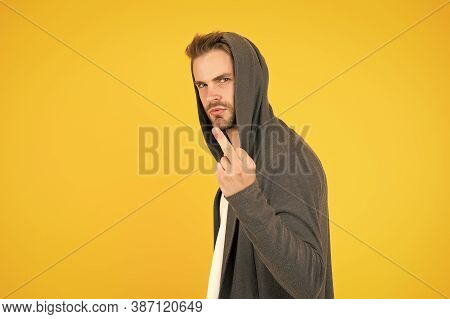 Rude And Bad. Rude Guy Show Middle Finger Yellow Background. Rude Hand Gesture. Sign Language. Rude 