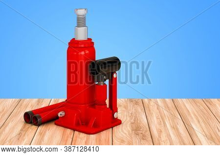 Hydraulic Bottle Jack On The Wooden Table, 3d Rendering