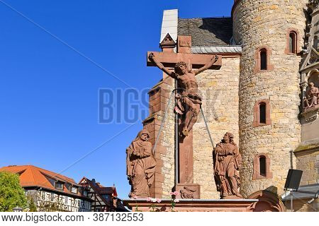 Heppenheim, Germany - September 2020: Sculpture Of Jesus On Cross In Front Of Old Church Called St. 