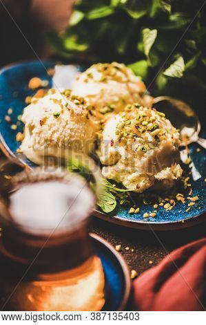Turkish Traditional Dessert Semolina Helva With Pistachio And Fresh Mint
