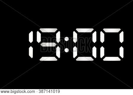 Real White Led Digital Clock On A Black Background Showing Time 19:00