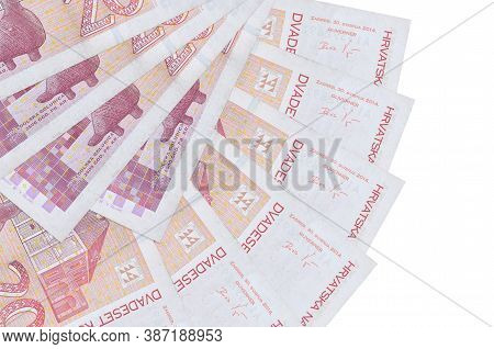 20 Croatian Kuna Bills Lies Isolated On White Background With Copy Space Stacked In Fan Shape Close 