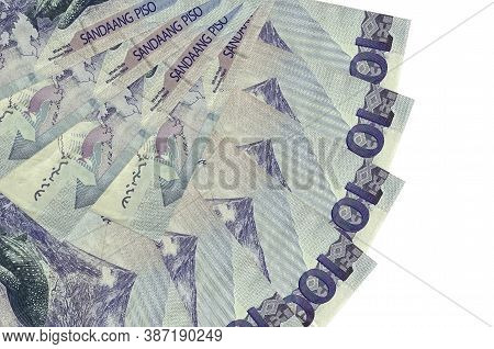 100 Philippine Piso Bills Lies Isolated On White Background With Copy Space Stacked In Fan Shape Clo