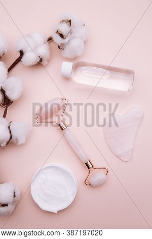 Selfcare, Relaxation And Beauty Care Concept. Modern Apothecary Or Home Spa Composition On Pink Back