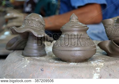 Small Raw Pottery Before Burn In The Kiln, At Kret Island In Nonthaburi Thailand.