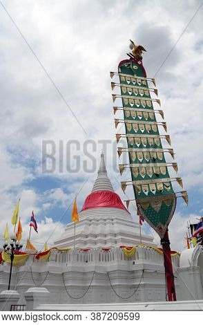 Centipede Flag And White Pagoda Has A Red Cloth Tied At The Top Surrounded By Thai National Flag, Ye