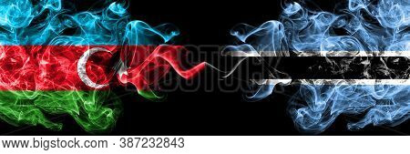 Azerbaijan, Azerbaijani Vs Botswana, Botswanan Smoky Mystic Flags Placed Side By Side. Thick Colored