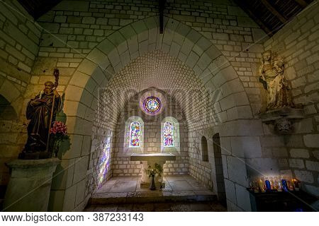 Saint Wandrille, France - July Circa, 2020. This Old Stone Arcade You Have To Go To The Interior Hea