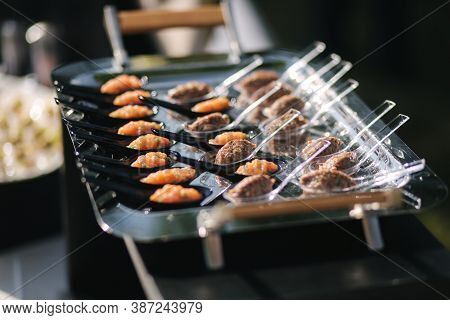 Portioned Tartare Of Beef And Samlon. Snack Outdoors In Sunset