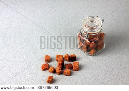 A Glass Can Of Dentils Isolated On Gray Background. Image Contains Copy Space