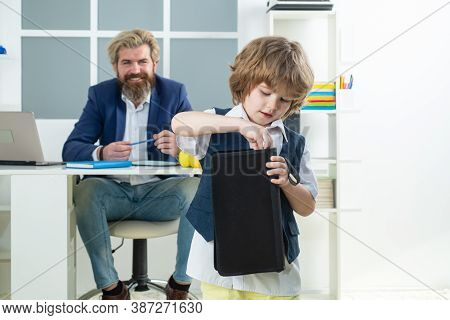 Little Boss. Little Businessman Bossy Child Working In Office. Business People Talking And Discussin