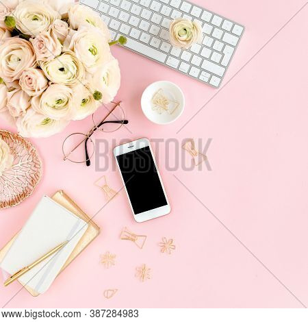 Stylized, Pink Womens Home Office Desk. Workspace With Computer, Bouquet Ranunculus And Roses, Phone