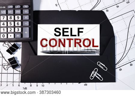 Self Control.text On White Paper On Black Envelope