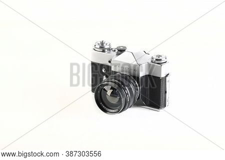 The Old Soviet 35 Mm Slr Camera Zenit-b, Released 1972 On White Background.