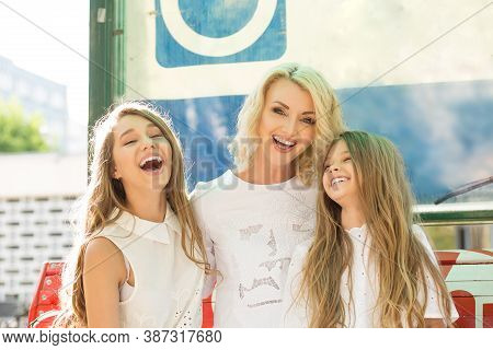Happy Family Photo. Closeup Portrait Photo Toothy Smiling Laughing Two Little Cute Girls, Her Mother