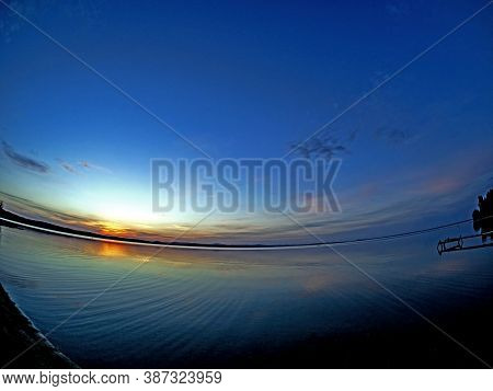 Calm Blue Sunset Sky Over The Lake, Calm Surface Of Water, Lake Uvildy, Fisheye