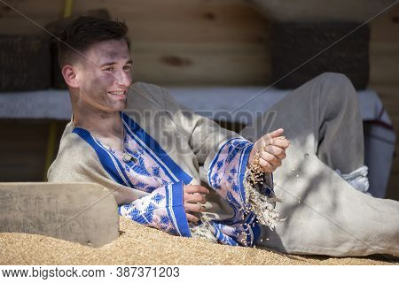 08 29 2020 Belarus, Lyaskovichi. Celebration In The City. Handsome Slavic Guy In National Dress In G