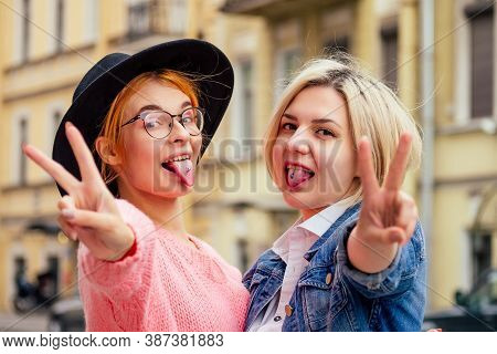 Two Cheerful Same Sex People In Love Walking Outdoors In Europe