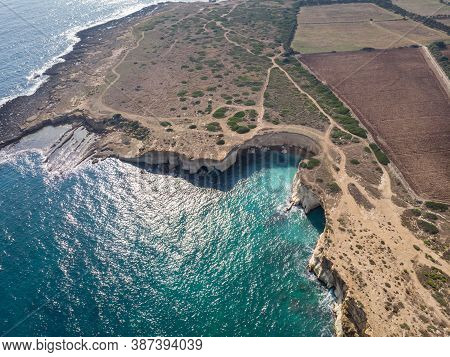 The Coastline With Cliffs And Caves At The Plemmirio, Syracuse