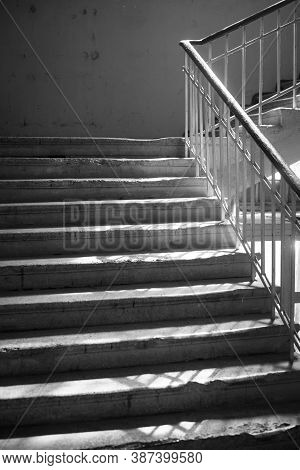 Brutalism In Architecture. Raw Concrete Steps Of Brutal Style Staircase. Concrete Prefab Stair. Blac