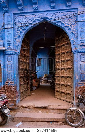 Blue house facade in streets of of Jodhpur, also known as 