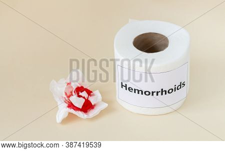 Used Bloody Toilet Paper Next To Clean Roll. Hemorrhoids And Constipation Treatment Concept. Copy Sp